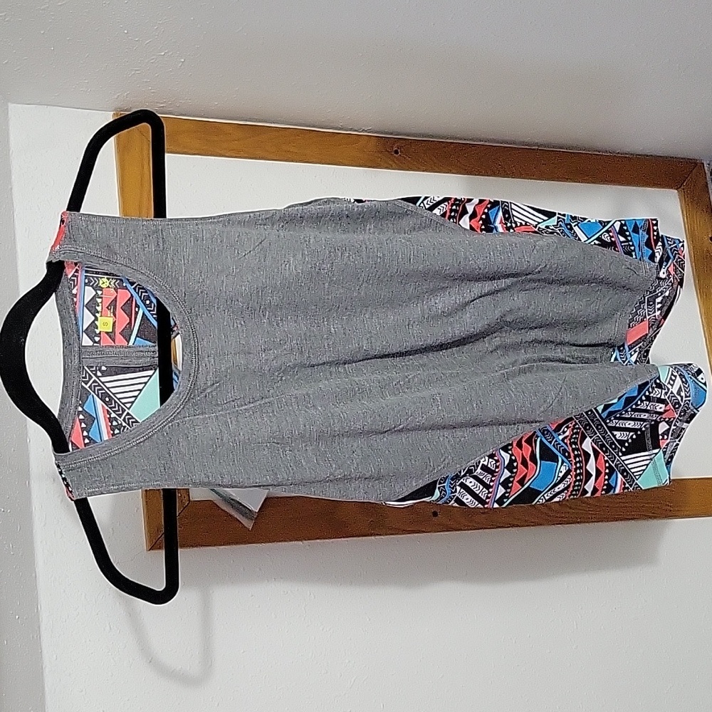 Gray racerback tank with multicolor geometric design